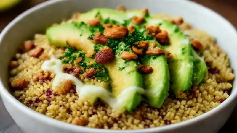A photorealistic, professional photography, 8K, cinematic lighting, sharp focus, depth of field, shot on a high-end DSLR of a vibrant, healthy quinoa bowl. The quinoa is perfectly cooked and adorned with contrasting textures: crunchy roasted almonds, creamy avocado slices, fresh herbs, and a drizzle of a light, glossy dressing. The focus is on the interplay of textures and colors, making the dish visually appealing and appetizing.